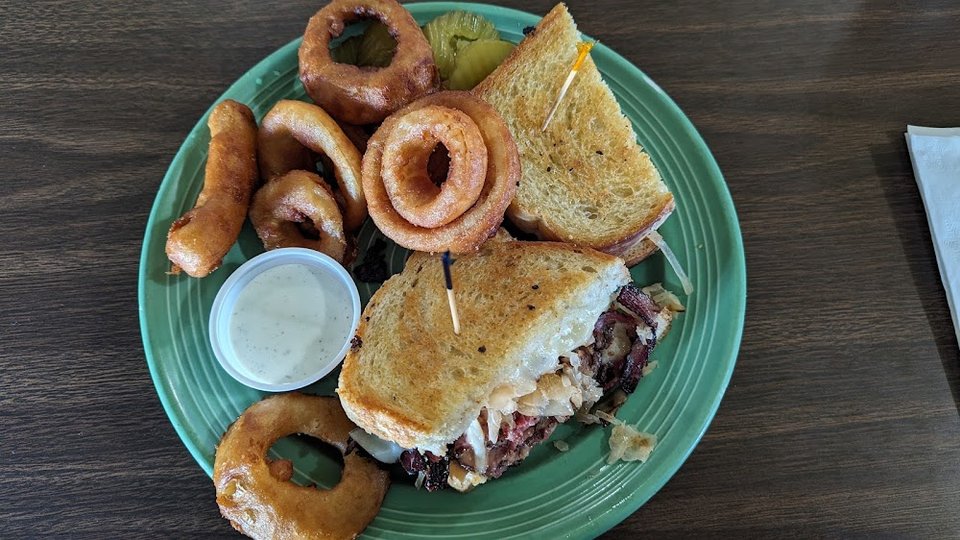 Pastrami Reuben Sandwich and Onion Rings